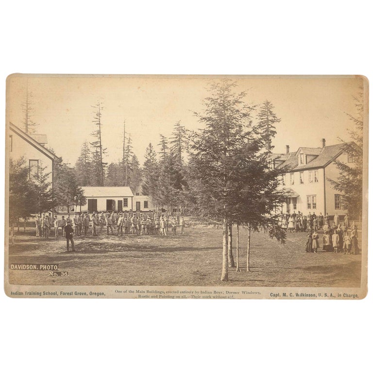 Item No: #307317 Indian Training School, Forest Grove, Oregon: One of the Main Buildings, erected entirely by Indian Boys; Dormer Windows, Rustic and Painting on all.—Their work without aid. [Cabinet card]. Isaac Grundy Davidson, studio of.